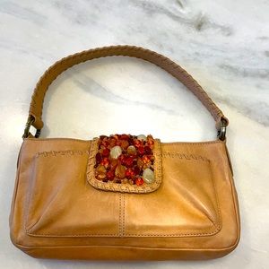 Tommy Bahama leather handbag with multi stones.